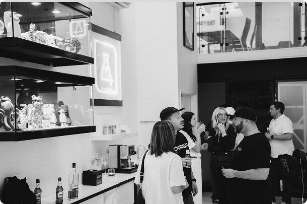 Team members collaborating in a creative workspace that embodies The Lab culture of innovation, open thinking, and shared drive